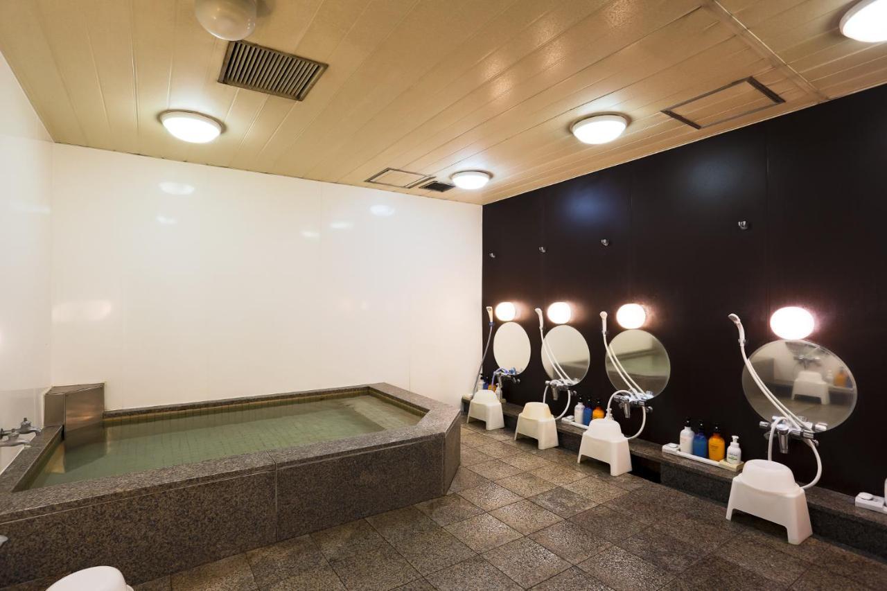 Hotel Capsule Land Yushima à Tōkyō Extérieur photo